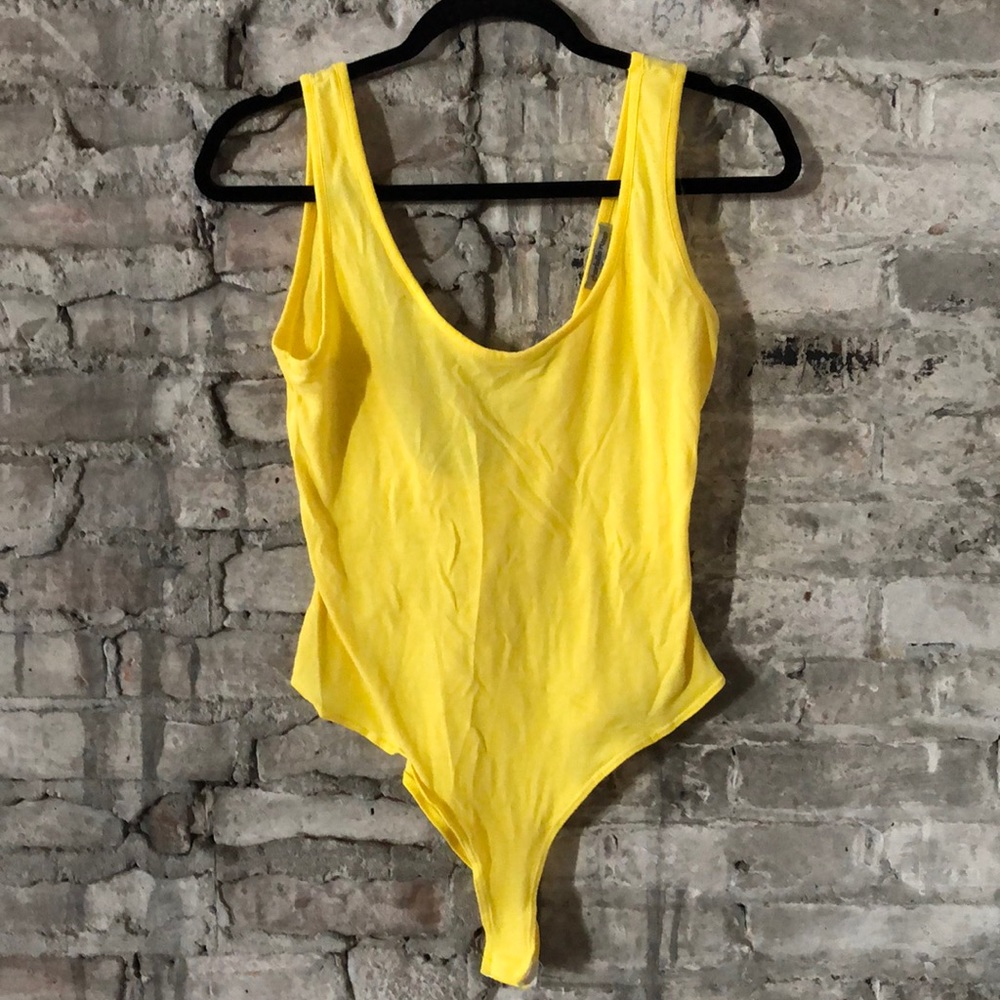 Yellow bodysuit